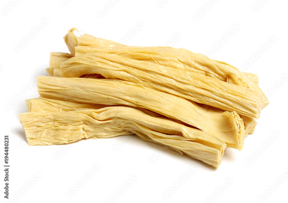 Tofu skin sticks on white background