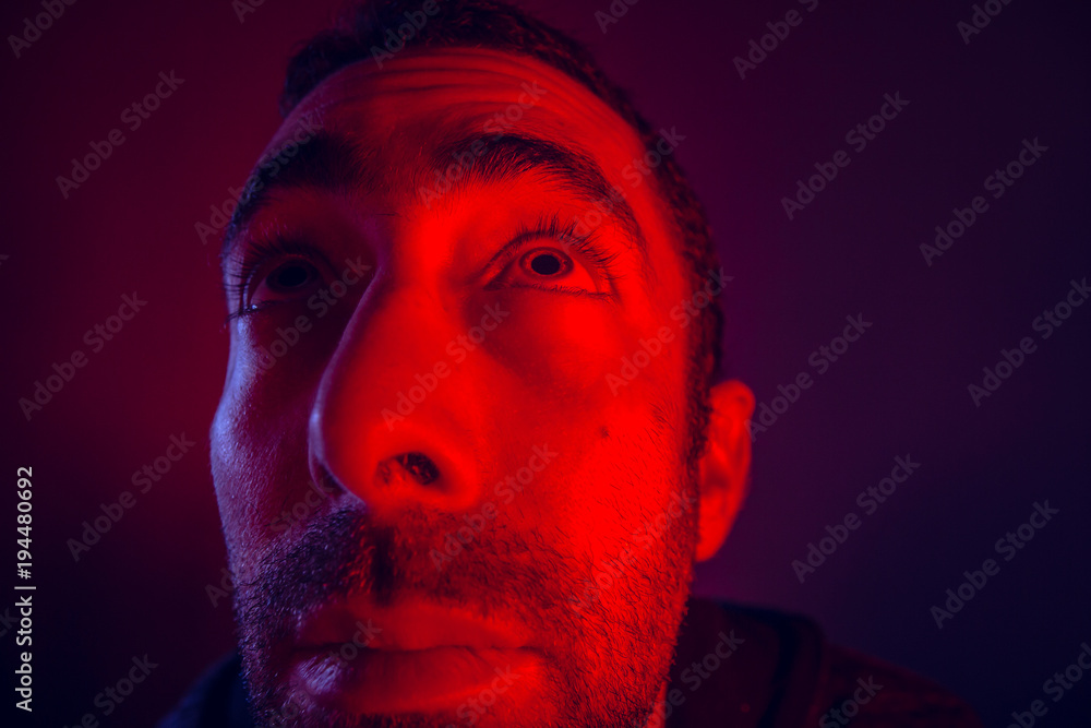 Fototapeta premium Man with hope facial expression looking up