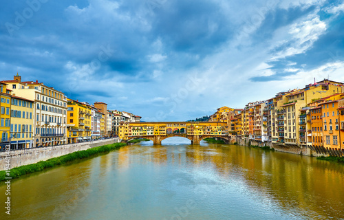 Panorama view to ancient bridge Ponte Vecchio at river Arno