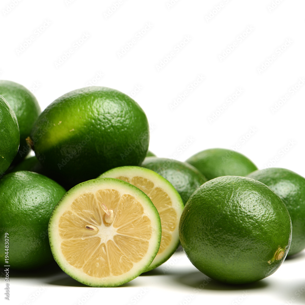 multiple limes on white background multiple limes on white background