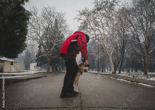 Walking a dog on a snowy day