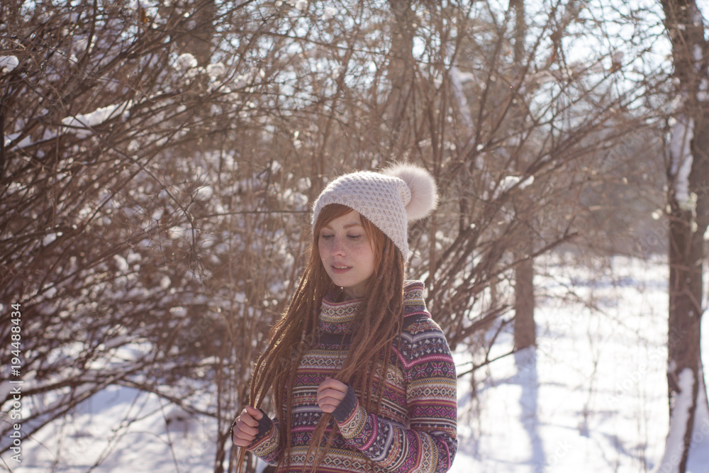 portraits of beautiful young woman in winter park portraits of beautiful young woman in winter park