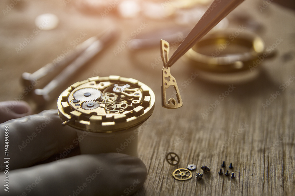 Process of installing a part on a mechanical watch, watch repair Process of installing a part on a mechanical watch, watch repair