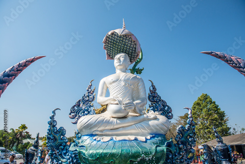 White Upakut monk statue photo