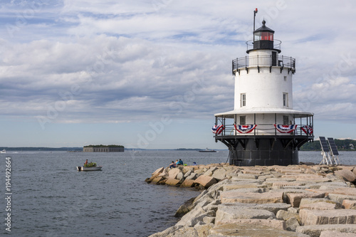 Fisherman Works Near Spring Point Lighthouse in Maine