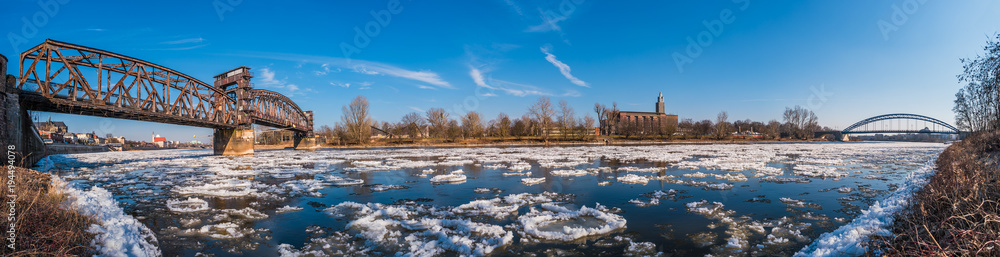 Panoramic view of Magdeburg downtown during ice drift at Elbe, Germany Panoramic view of Magdeburg downtown during ice drift at Elbe, Germany