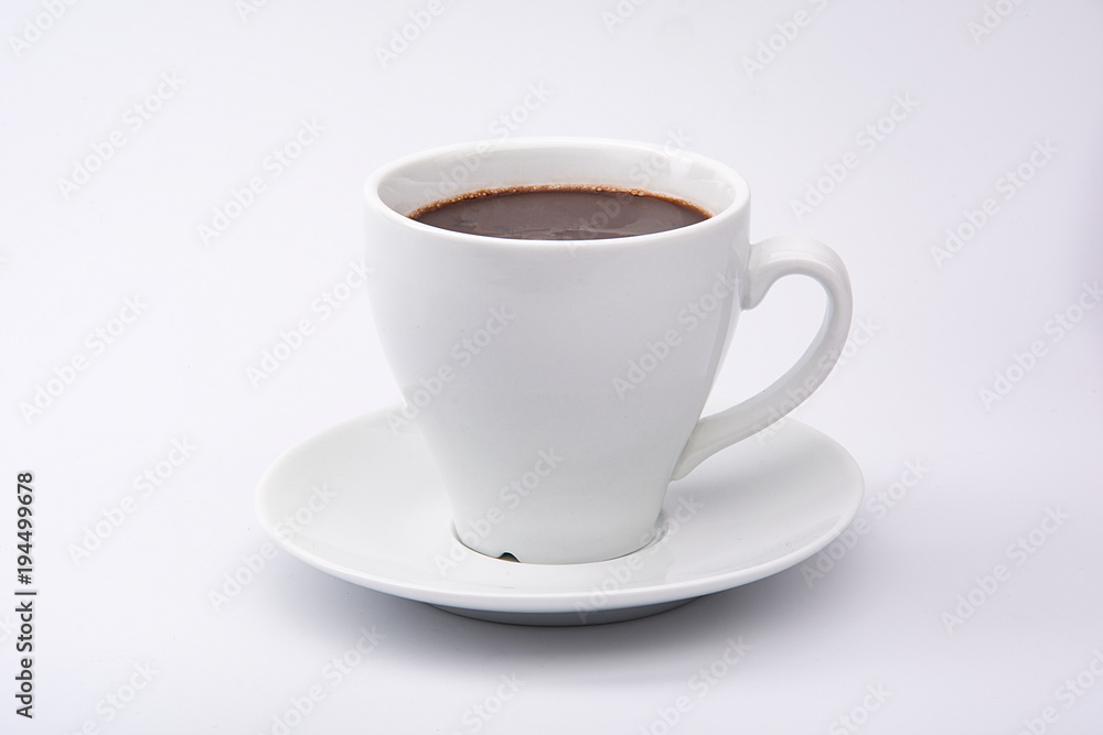 Hot chocolate drink in white cup isolated on white background, food concept Hot chocolate drink in white cup isolated on white background, food concept