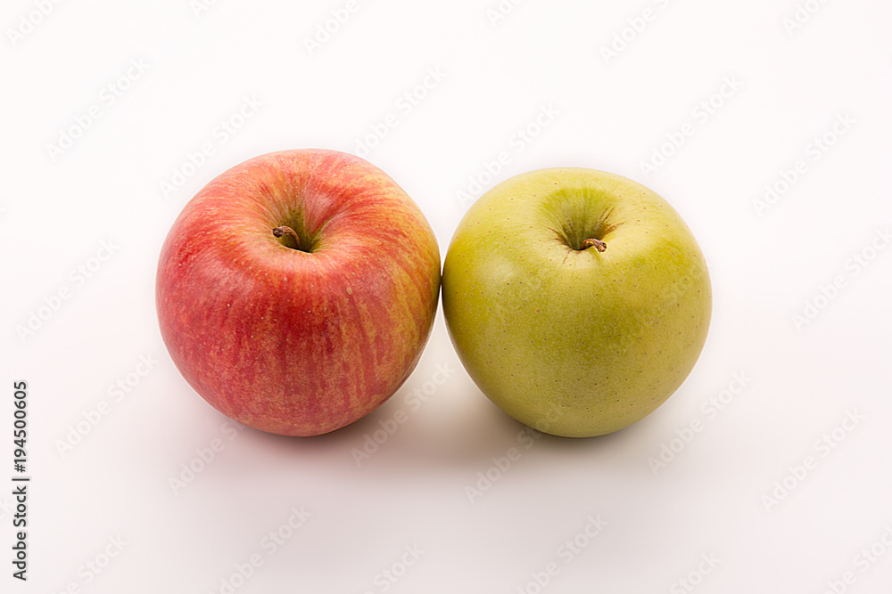 Red and yellow apples isolated on white background. Red and yellow apples isolated on white background.