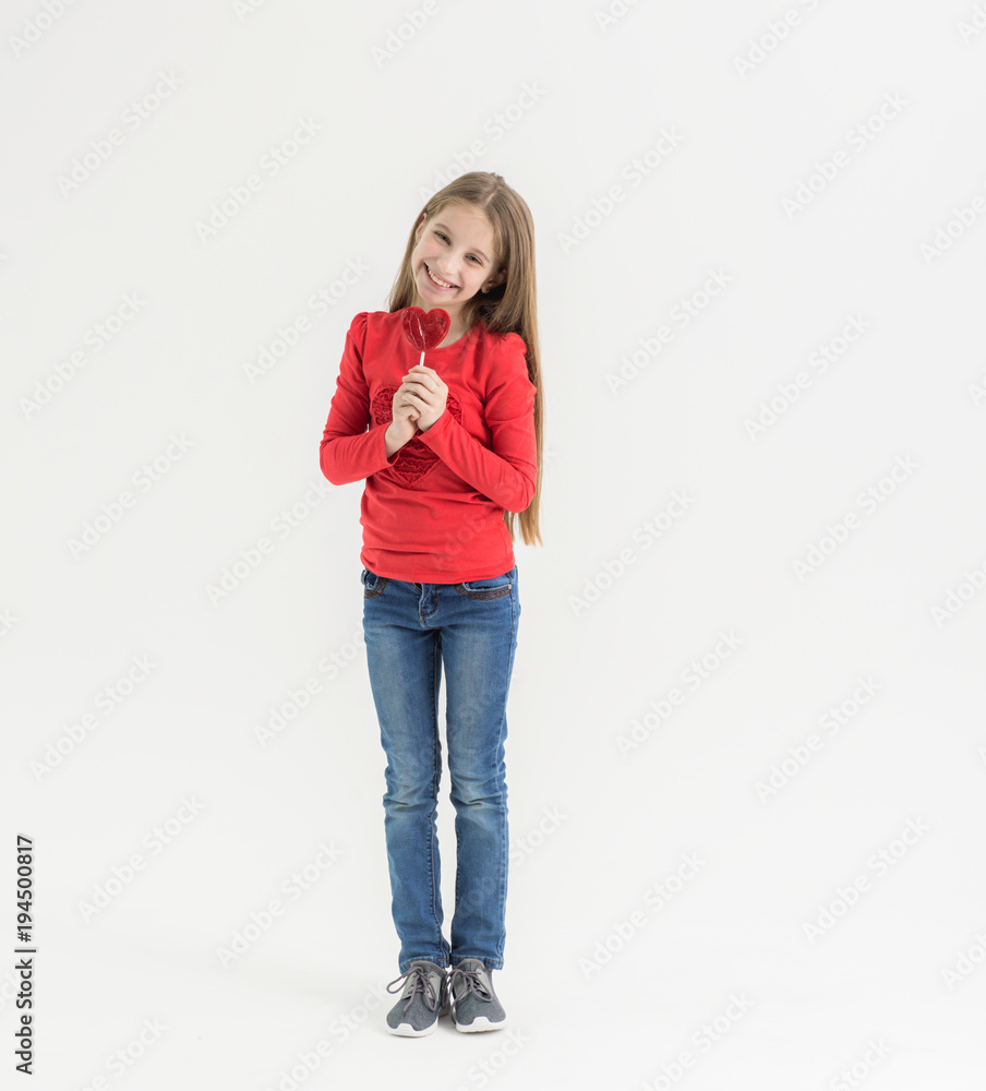 teenage girl with heart shaped lollipops teenage girl with heart shaped lollipops