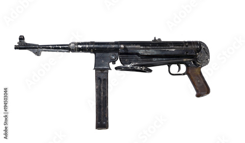 Foto vintage shabby submachine gun with folding butt, isolated