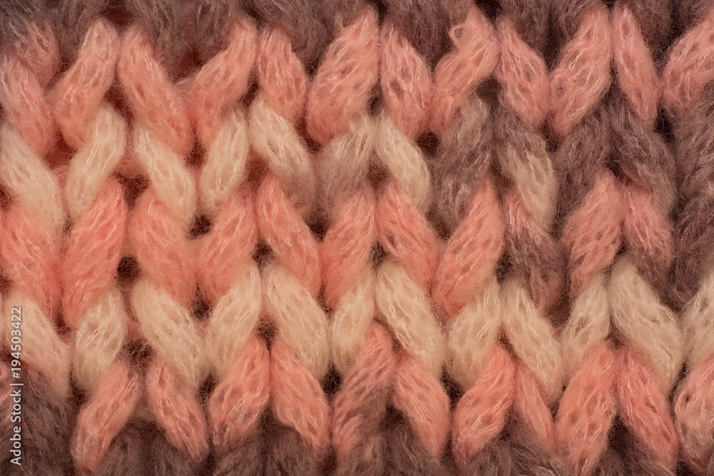 Knitted background. Knitted texture. Knitting pattern of wool. Knitting. Background. Knitted background. Knitted texture. Knitting pattern of wool. Knitting. Background.