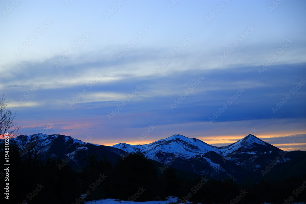 cloudy sky at sunset in Pyrenees. Ariege in south of France