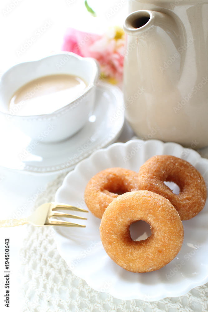 Homemade sugar donut and tea Homemade sugar donut and tea