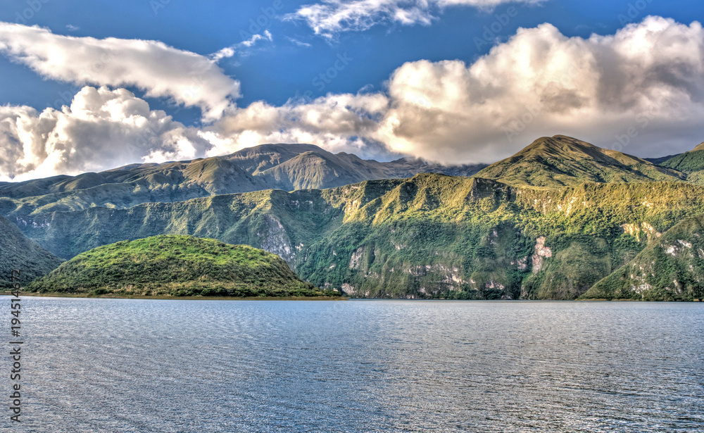 View of the Cuicocha lake and crater, on a sunny and cloudy afternoon, in Ecuador