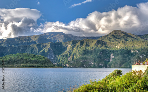 View of the Cuicocha lake and crater, on a sunny and cloudy afternoon, in Ecuador