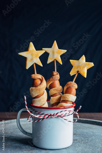 Star themed hotdogs in a metallic cup photo