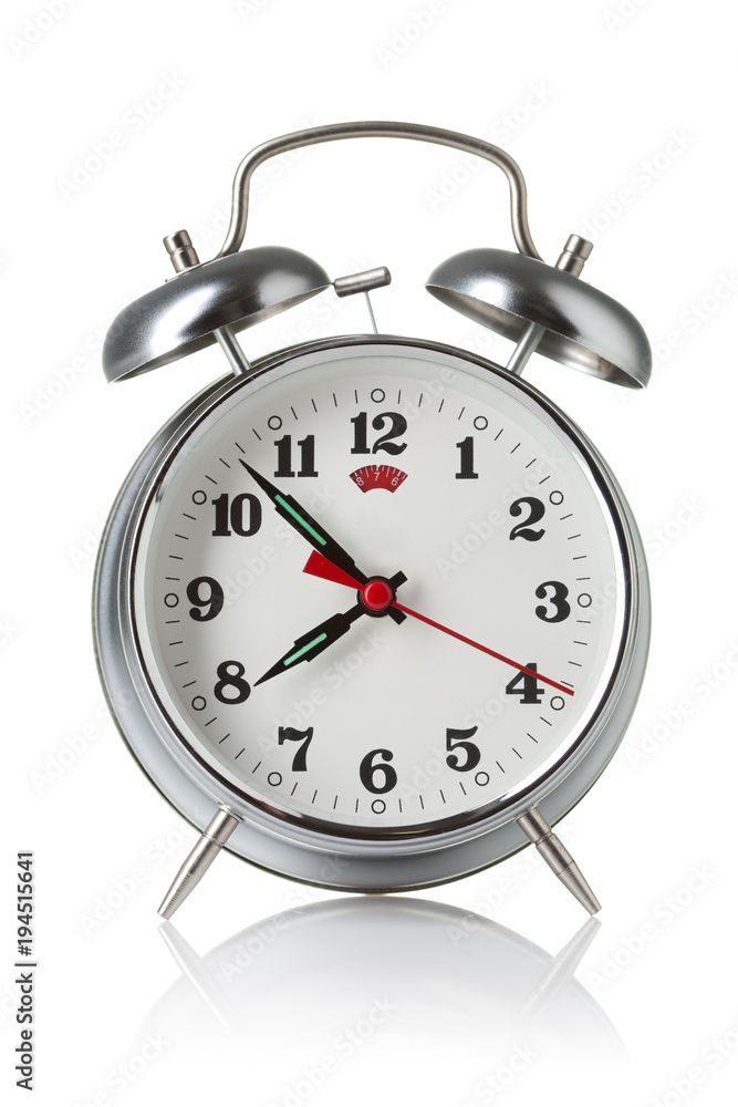 Silver alarm clock isolated on white background Silver alarm clock isolated on white background
