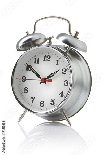 Silver alarm clock isolated on white background