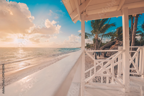 Fototapeta Naklejka Na Ścianę i Meble -  Punta Cana sunrise over Caribbean beach in  with lifeguard station