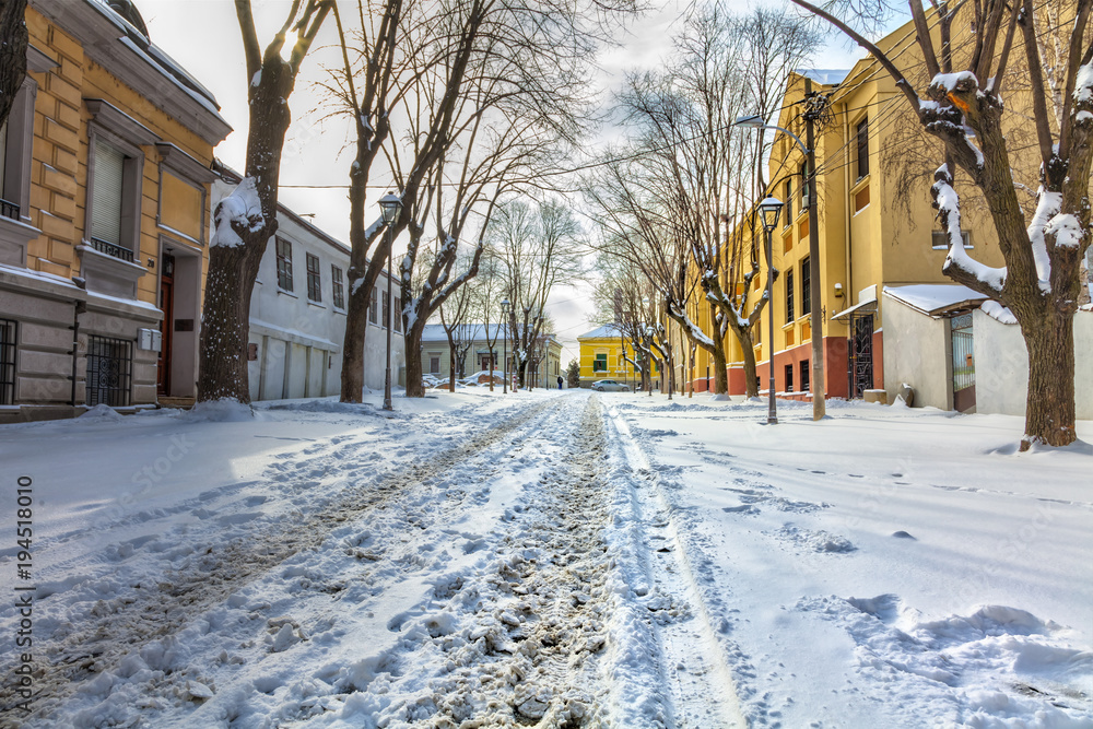 The old street in Belgrade Kosancicev venac is covered with snow. HDR images