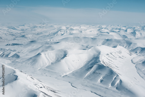 snow covered summits in an arctic mountain range