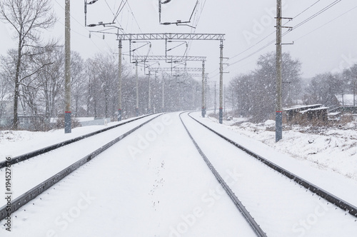 Blizzard on the railway tracks in winter