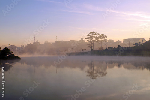 Da Lat morning with lake in fog