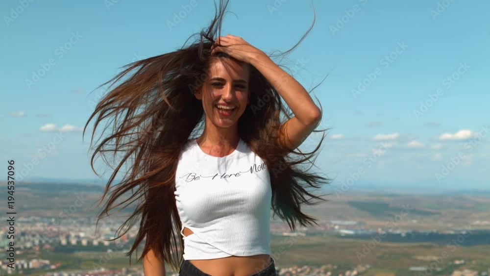 Wind blowing through a woman's hair Stock Video | Adobe Stock
