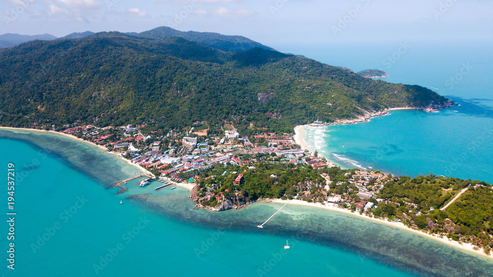 Aerial view from the drone on the sand beach of Haad Rin area in koh Phangan island,Thailand
