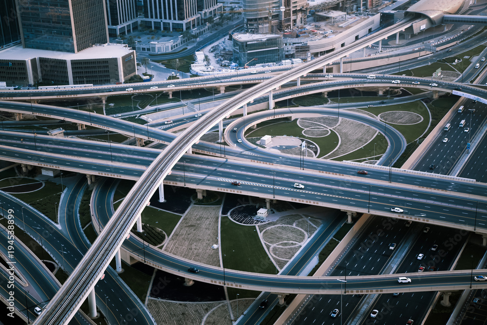 DUBAI, UAE - FEBRUARY 2018: Traffic on a busy intersection on Sheikh Zayed highway