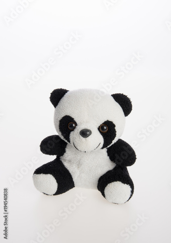 toy or panda soft toy on a background.