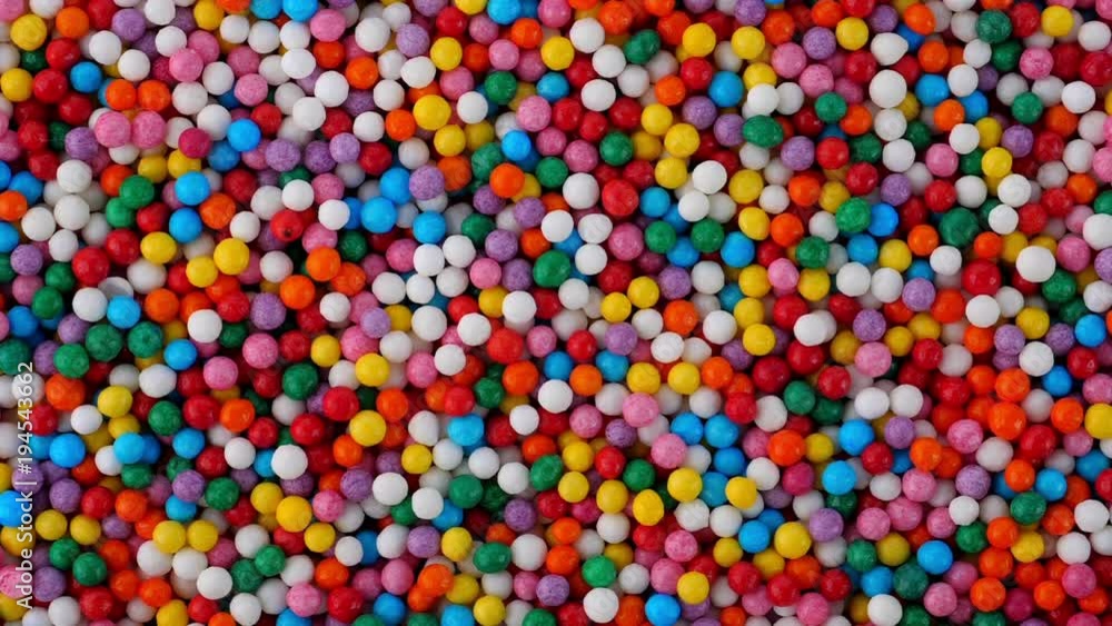 Colorful sprinkles sugar candy fly after being exploded in blender. Close-up shot.
Colorful sprinkles sugar candy fly after being exploded in blender. Close-up shot.
