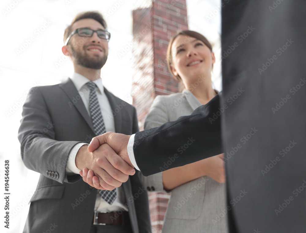 friendly handshake of business people. friendly handshake of business people.