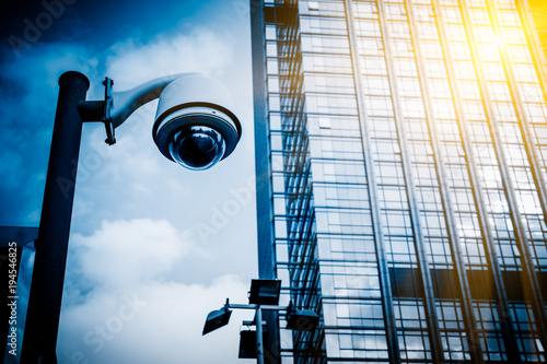 surveillance camera with modern buildings on background,shanghai,china.