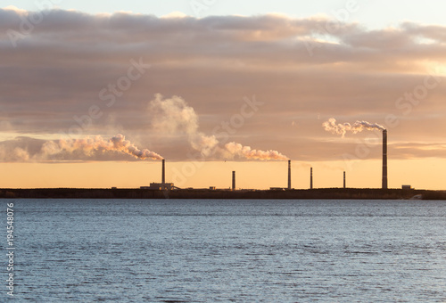 Smoke from the pipes of an industrial plant in the morning © schankz
