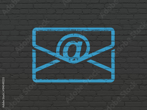 Finance concept: Painted blue Email icon on Black Brick wall background