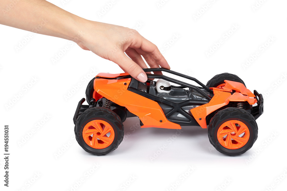 RC model rally, off road buggy in hand. Isolated on white background, joy and fun sport RC model rally, off road buggy in hand. Isolated on white background, joy and fun sport