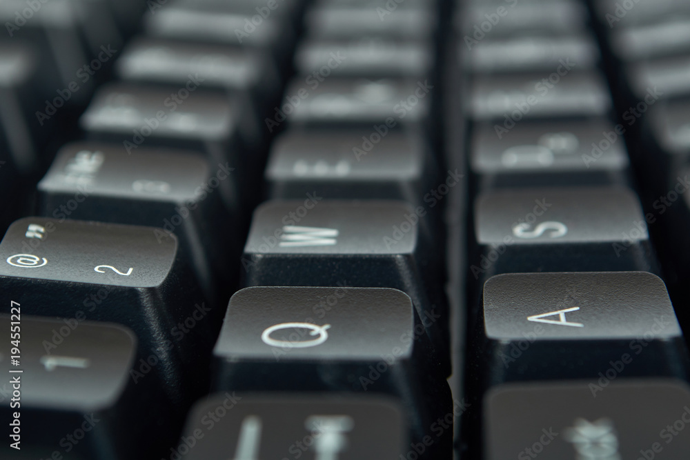 Black mechanical computer keyboard. Macro image, technology background, close up buttons