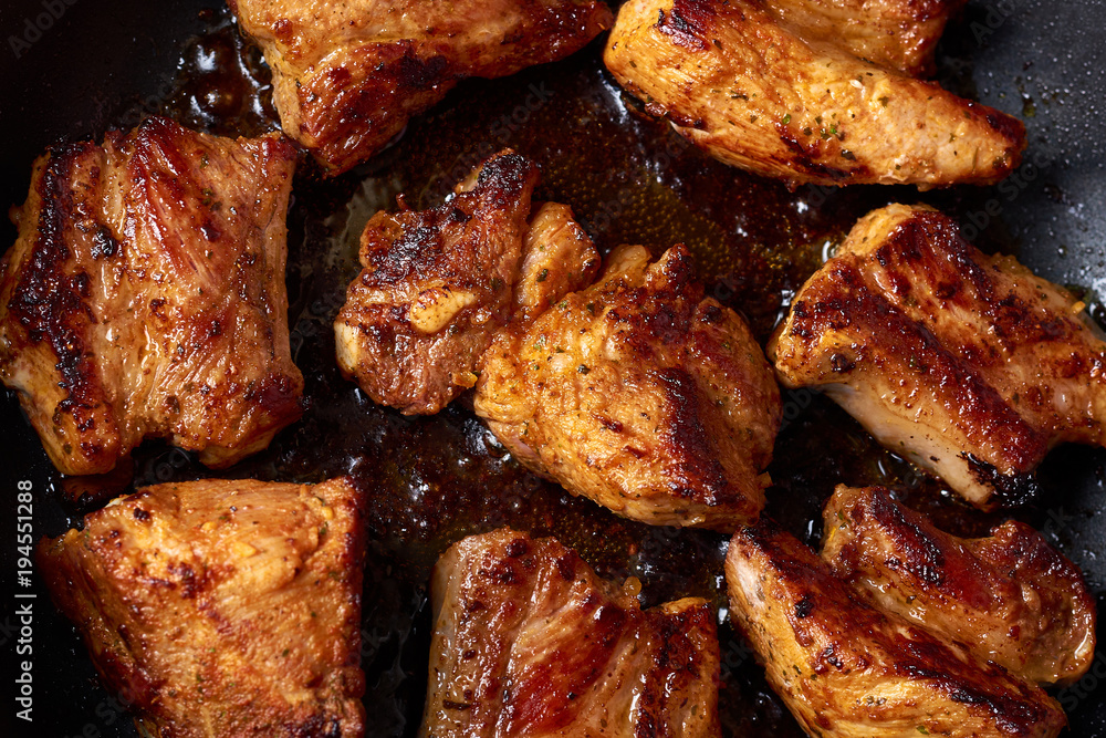 Juicy roasted meat with herbs. BBQ and grill food Juicy roasted meat with herbs. BBQ and grill food