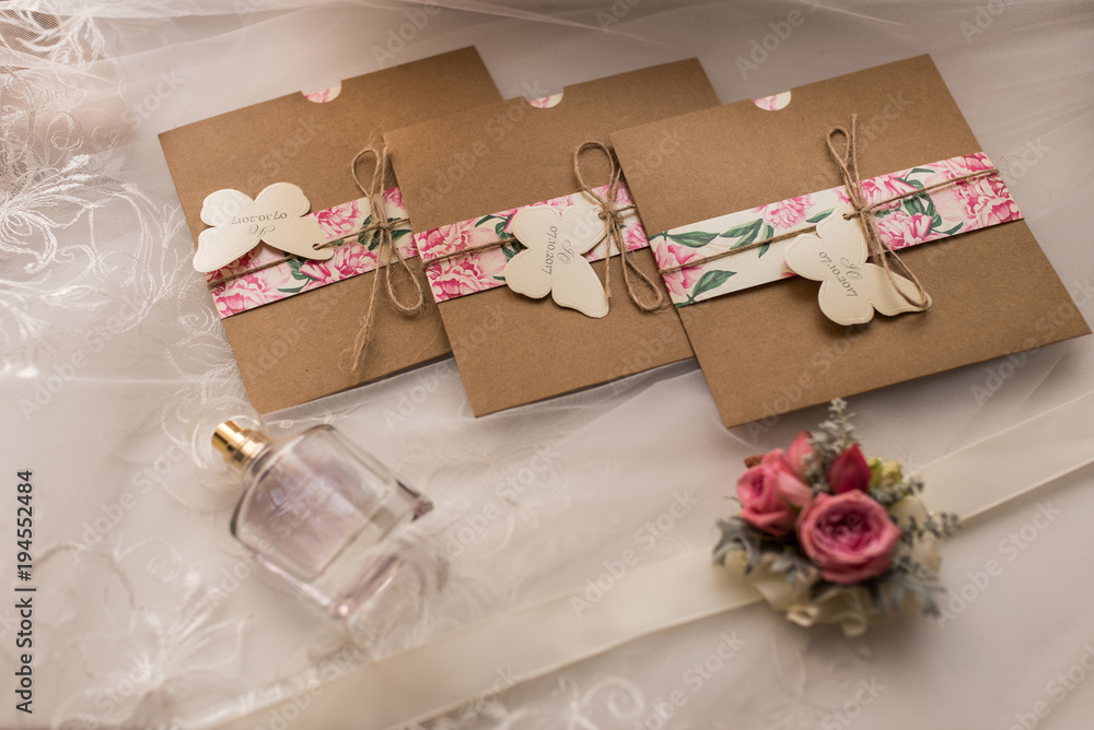 Wedding invitations in the craft envelopes. Wedding concept. Wedding accessories. Wedding invitations in the craft envelopes. Wedding concept. Wedding accessories.