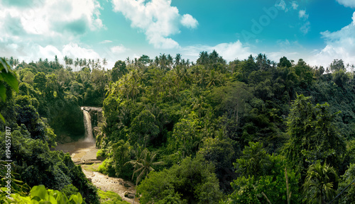 Waterfall panorama in amazonian tropical rain forest with big river in the middle of jungle photo