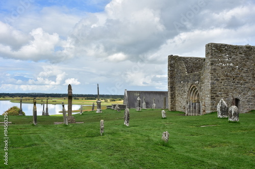 Tidal River Shannon with ruins and crosses of monastery of Clonmacnoise in Ireland. photo