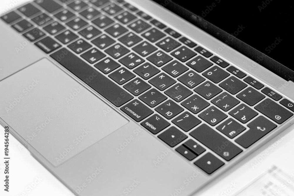 Laptop keyboard, buttons.