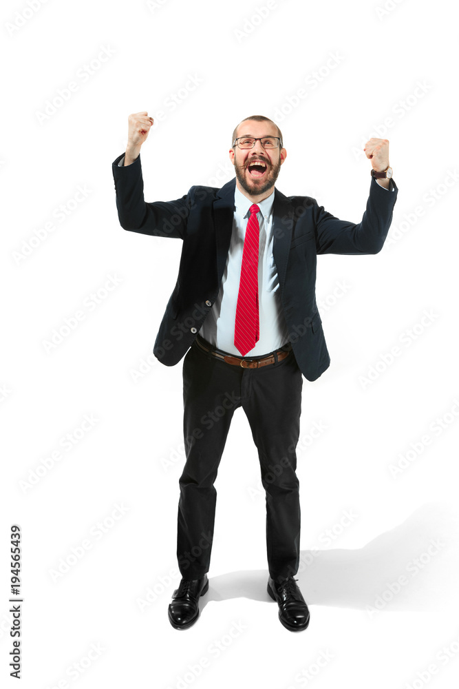 Winning success man happy ecstatic celebrating being a winner. Dynamic energetic image of male model Winning success man happy ecstatic celebrating being a winner. Dynamic energetic image of male model