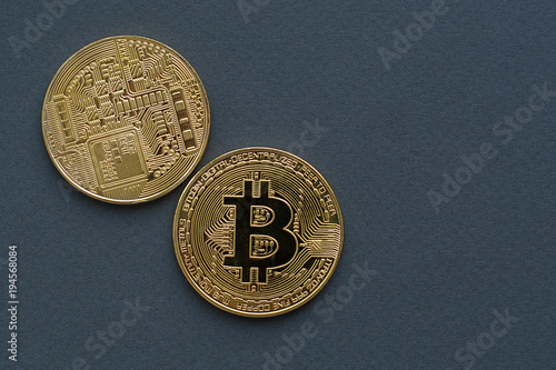 Golden Bitcoins. New virtual money. photo