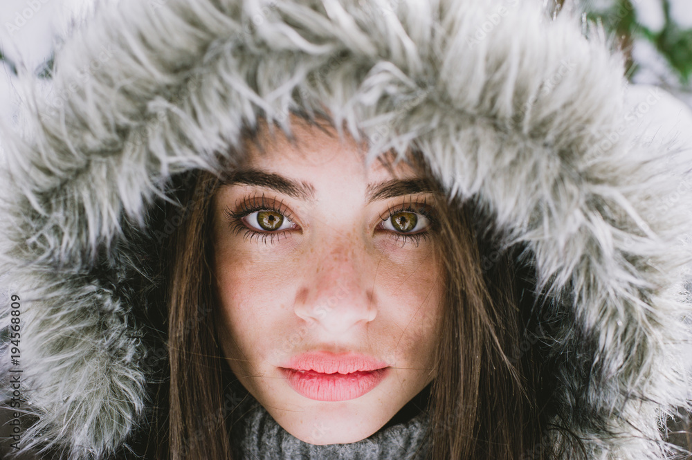 A beautiful woman in the snow A beautiful woman in the snow
