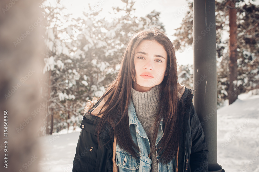 A beautiful woman in the snow A beautiful woman in the snow