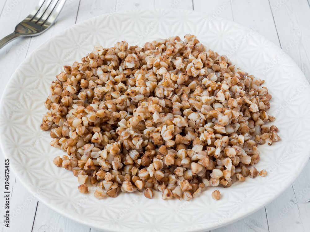 Buckwheat porridge in a plate, healthy food. Buckwheat porridge in a plate, healthy food.
