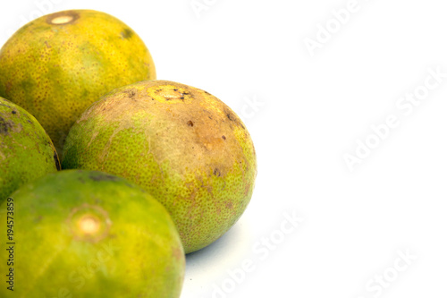 close up of lime lemon isolated on white