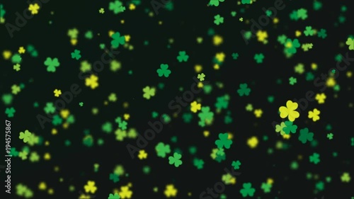 Saint Patrick's Day background. Abstract loopable flying clover leaves made of hearts over dark green background